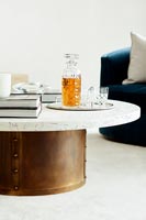 Modern coffee table with decanter and glasses 