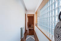 Modern corridor with glass block wall 