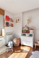 Furniture and toys in childrens room 