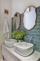 Blue and white modern bathroom - twin sinks 
