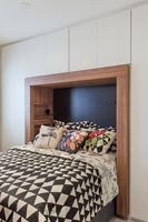 Modern bedroom with built in wardrobes 