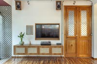 Double wooden doors in modern industrial living room 