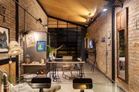 View of small open plan industrial style apartment 