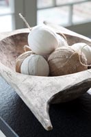 Cotton and hessian baubles in bowl 