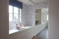 Large wardrobes and cabinets in modern dressing room 