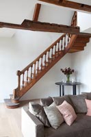 Wooden staircase in living room