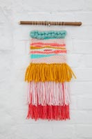 Woven fabric decoration hanging on wall 