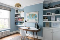 Modern home office with blue walls