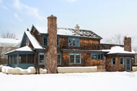 Snowy brick house