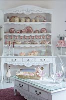 Dresser with display of crockery in country dining room 