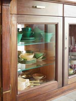 Reclaimed cabinet displaying crockery 