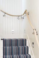 Modern staircase with rope bannister 