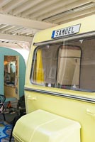 Yellow vintage caravan with personalised number plate in childrens room 