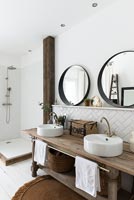 Twin sinks in modern wooden bathroom 