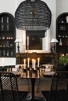 Monochrome modern dining room with candles 