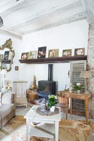 Wood burning stove in rustic country living room 