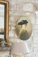 Classic portrait painting on stone wall 