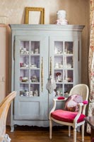Pale grey painted dresser in classic living room 