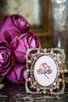 Ornate picture frame with flowers 