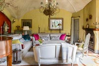 Yellow painted walls in country living room