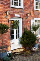 Country house door with Christmas wreath 