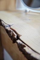 Close up edge of wooden table 