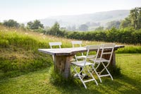 Country garden with table and chairs 