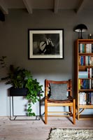Modern living room furniture with photograph and planter