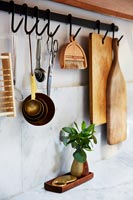 Kitchen utensils on hooks 