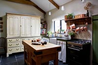 Large linen press in country kitchen  