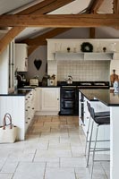 Range at end of modern country kitchen 