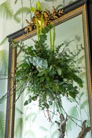 Classic mirror with hanging eucalyptus and pussy willow