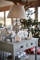Modern console table decorated for Christmas 