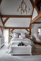 Modern bedroom with vaulted ceilings 