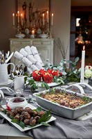 Christmas party food on table in country dining room 