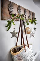 Coat hooks decorated for Christmas 
