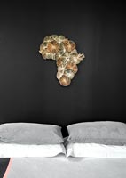 Textured Africa artwork above bed 
