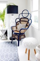 Unusual rattan armchair and fluffy stool 