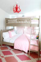 Bunk bed with ladder in modern childrens room 