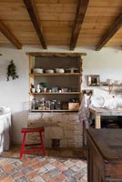 Rustic kitchen with alcove shelves 