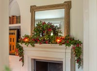 Stone fireplace decorated for Christmas 