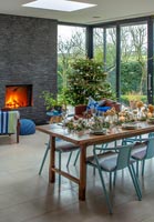 Dining room at Christmas in modern open plan space. 