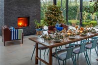 Dining room at Christmas in modern open plan space 