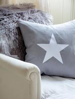 Grey and white star cushion 