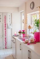 Modern white and pink kitchen 