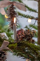 Silver candle and pine cone Christmas tree decorations 