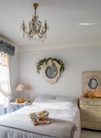 Classic bedroom with vintage furniture - Christmas decorations and gifts 