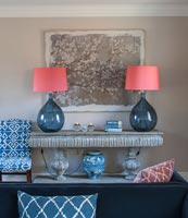 Apricot lamps in living room on stone side table 