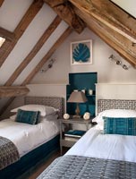Vaulted ceiling in country bedroom 