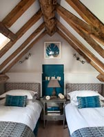 Vaulted ceiling in country bedroom 